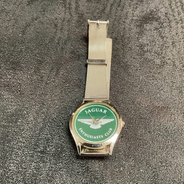 Silver Jaguar wristwatch with stainless steel bracelet.