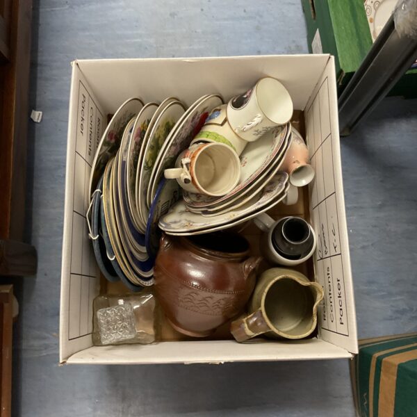 Mixed lot of vintage pottery and glass including plates and mugs.