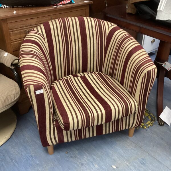 Front view of a vibrant striped bucket chair.