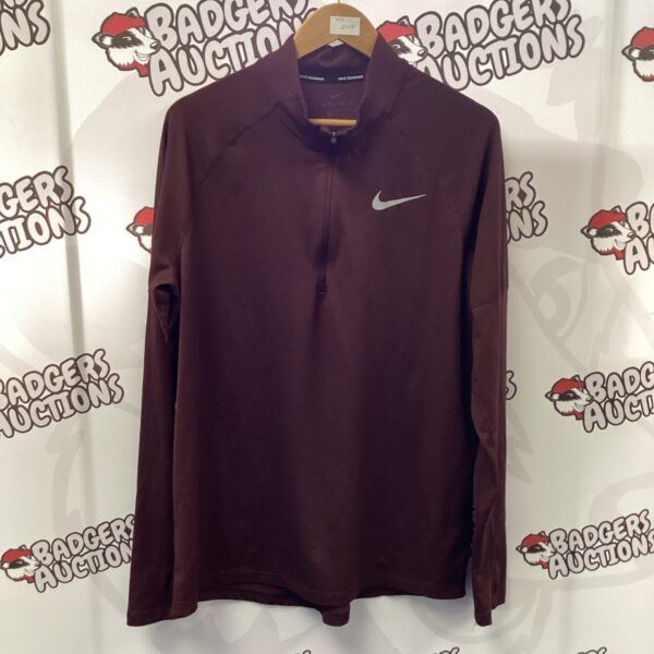 Nike running top size L, athletic performance wear.