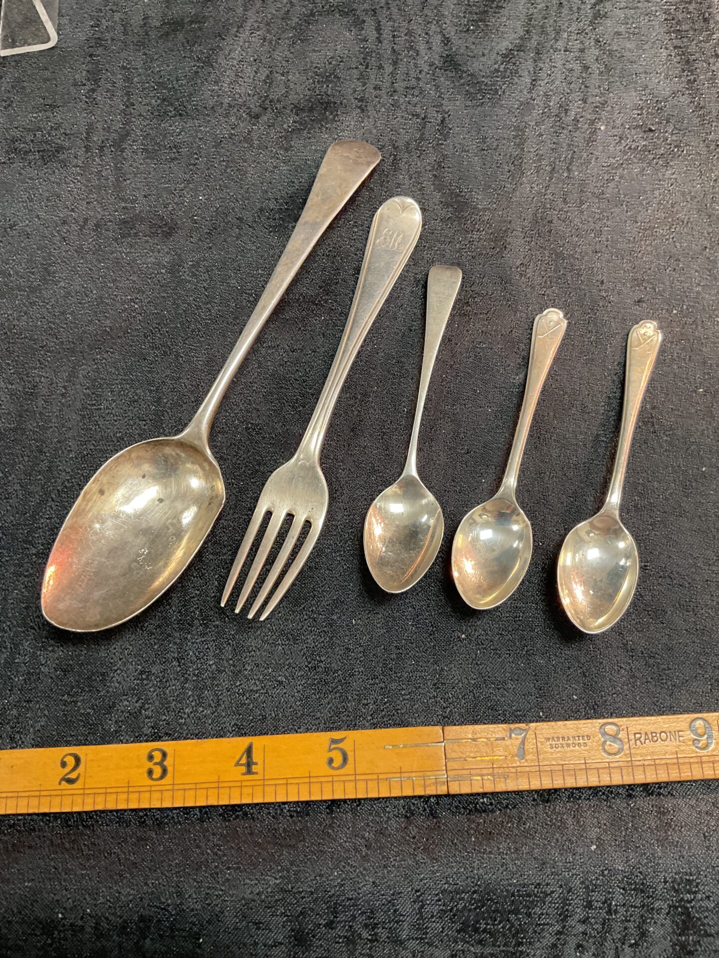 829 Four Hallmarked silver Georgian spoons and fork 122g
