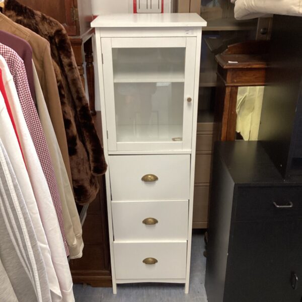 White three-drawer unit for bedroom or hallway storage.