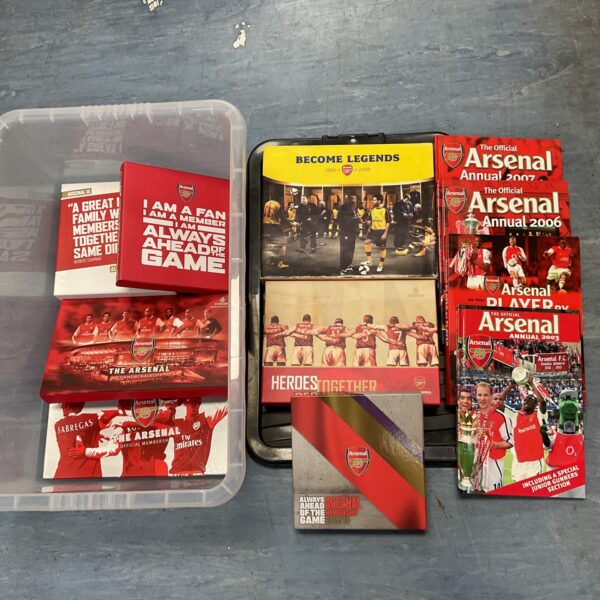 Arsenal membership collection with annuals and books.