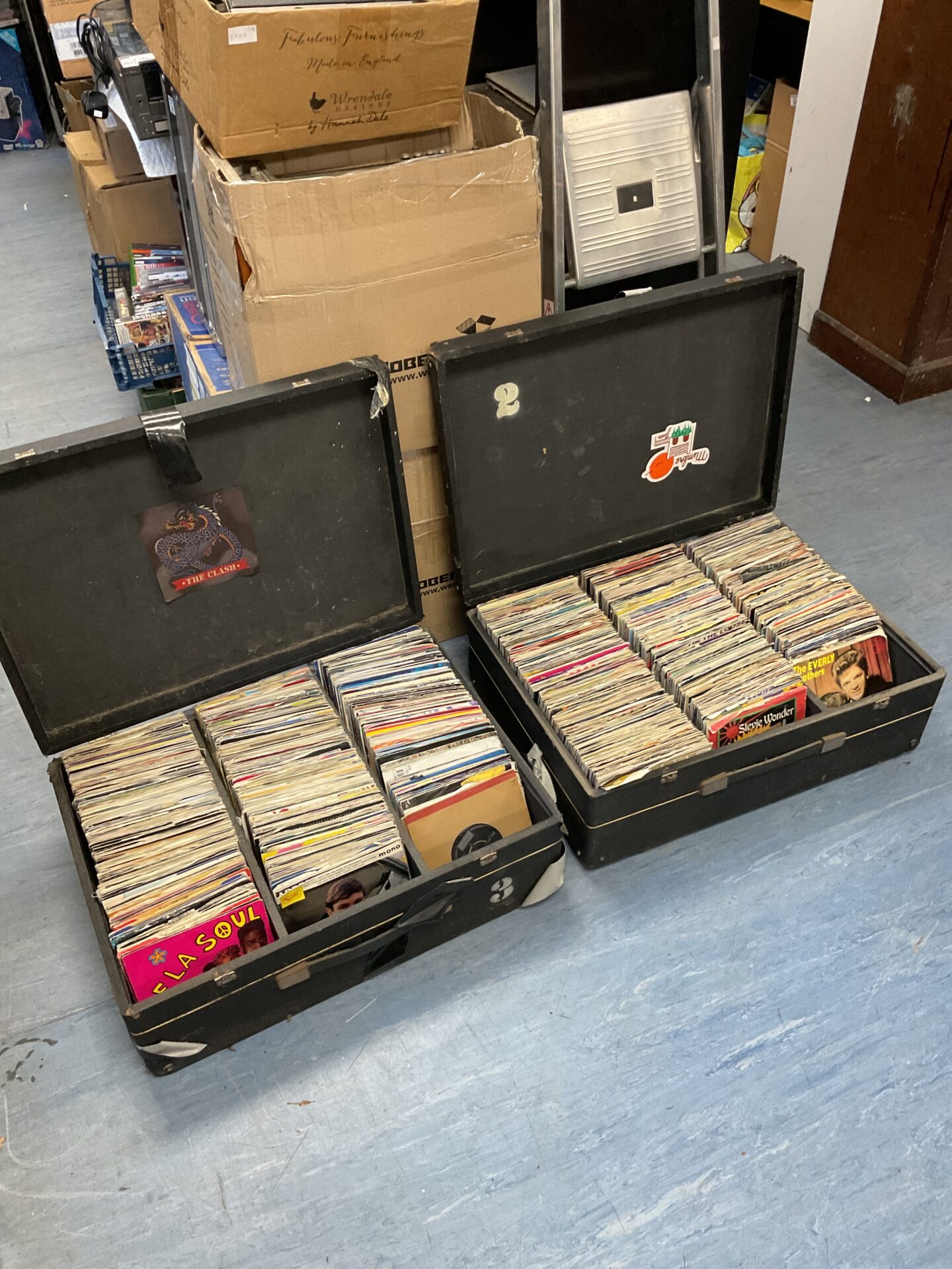 071 Two large cases full of 7” single vinyl records