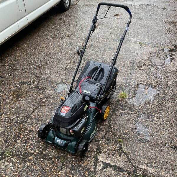 Used BMC lawn mower with Wolf 139cc engine for garden maintenance.