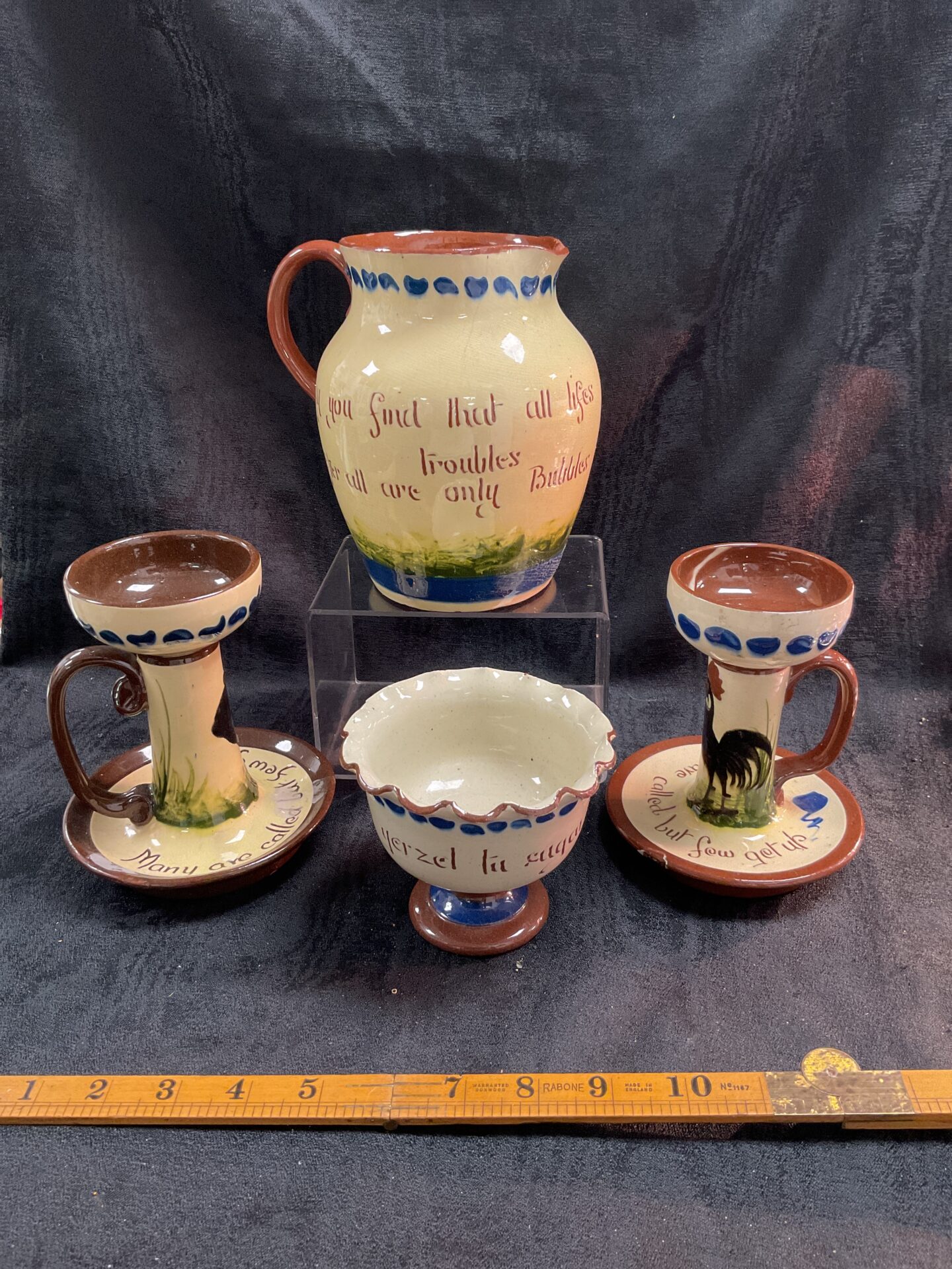 944 Four Torquay West Country pottery large jug two nightlights and a sugar bowl