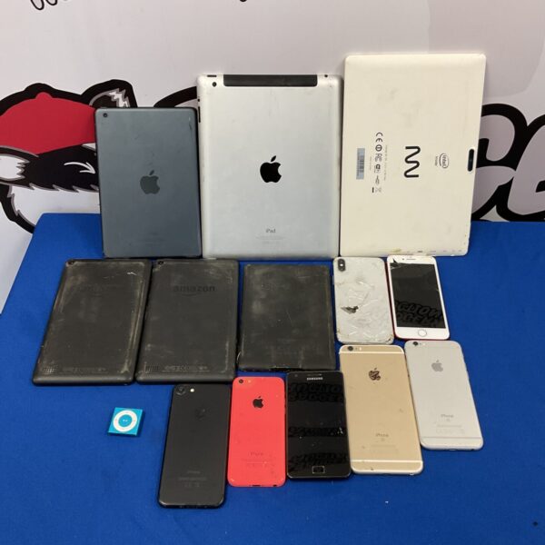 Overview of a tablet and phone bundle for repair or parts.