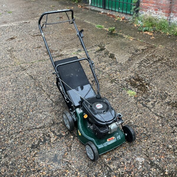 Webb WER41SP lawnmower in a garden setting.