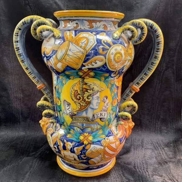 Antique Cantagalli majolica vase with serpent handles, vibrant colours.