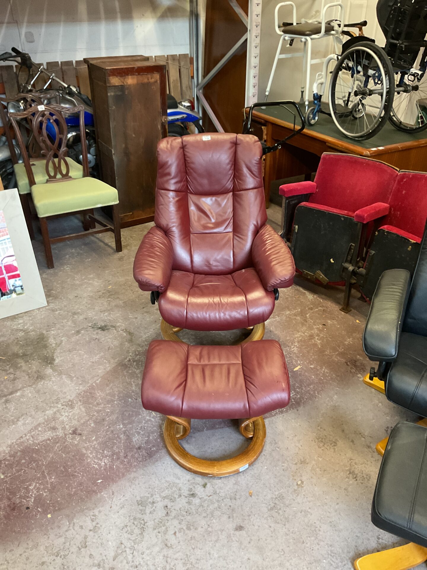 1058 Reclining Red leather arm chair with foot stool