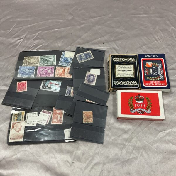 Vintage stamp and playing card lot for collectors.