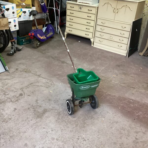 Vintage Scotts seed spreader for lawn and garden use.