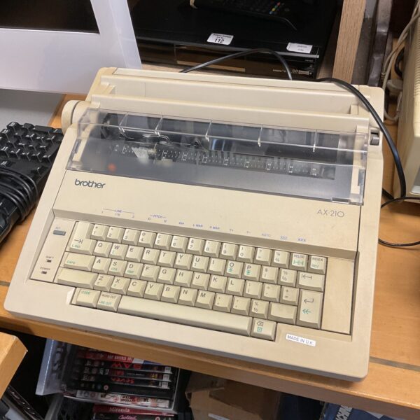 Vintage Brother AX-210 electric typewriter in off-white.