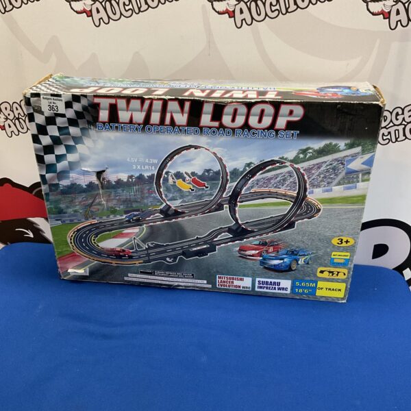 Vintage twin loop battery operated road racing set in box.