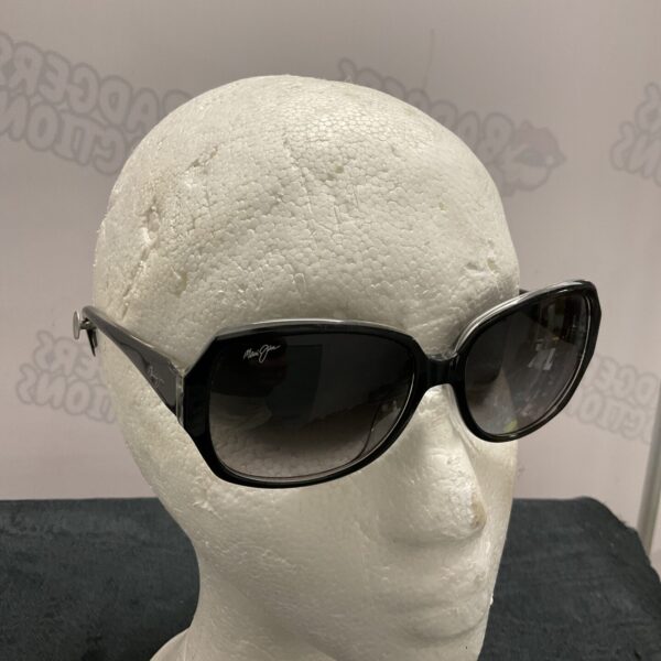 Black Maui Jim sunglasses with polarized lenses, stylish eyewear.