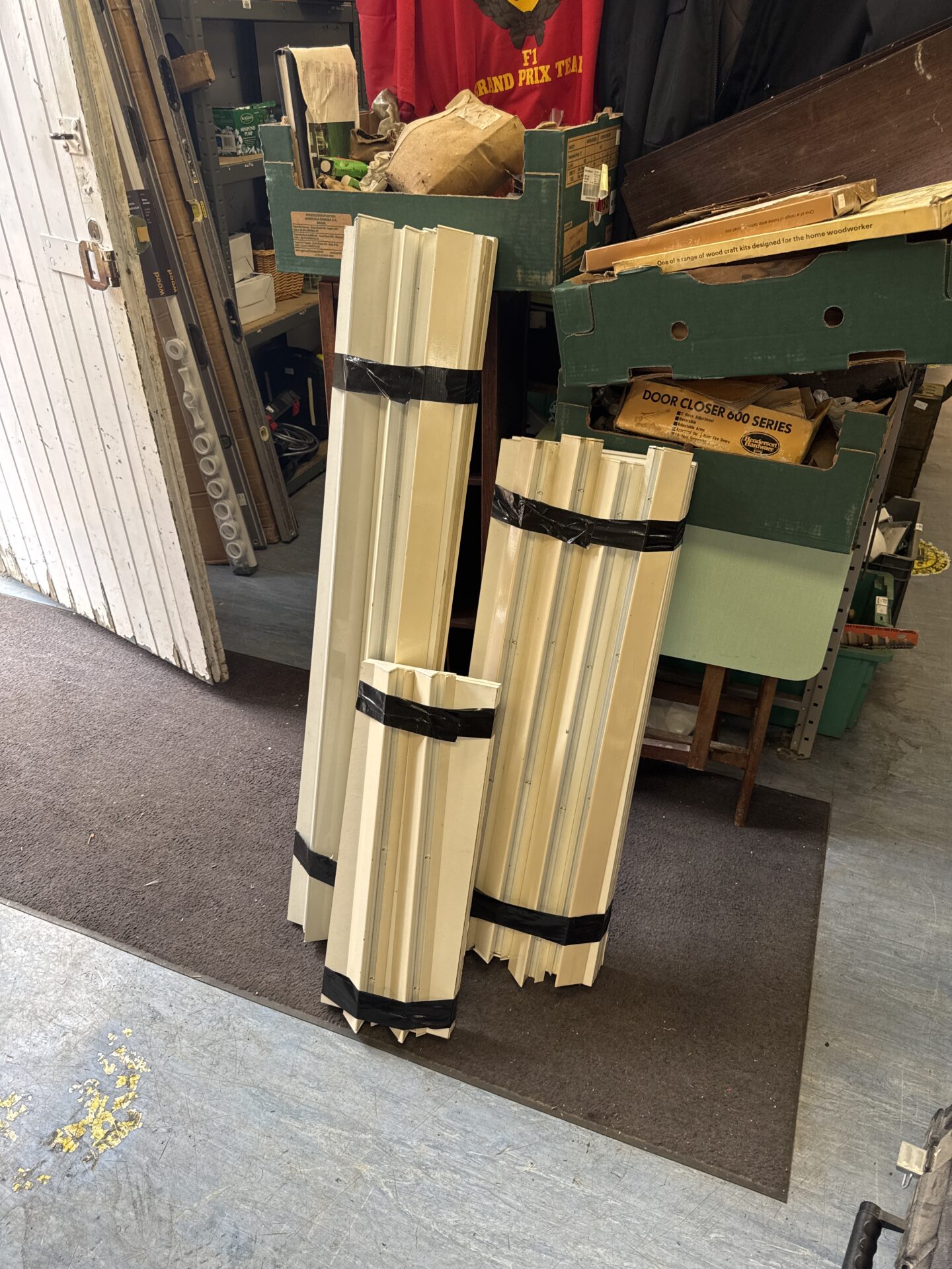 974 Three bundles of shelf units with wall brackets (3ft x 1ft, 4ft x 9 ins, 2ft x 9 ins)
