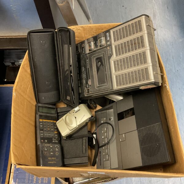 Vintage dictaphones and remote controls in a mixed lot.