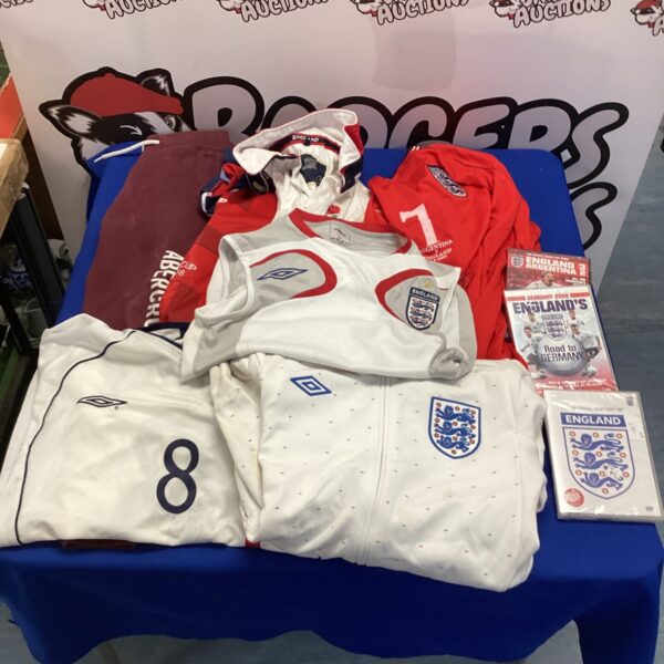 England football clothing bundle including shirt, shorts and hoodie.