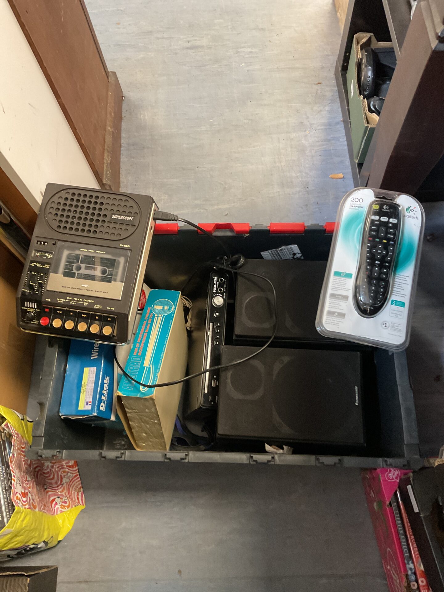 194 Box of electricals including new logitech remote & Panasonic speaker