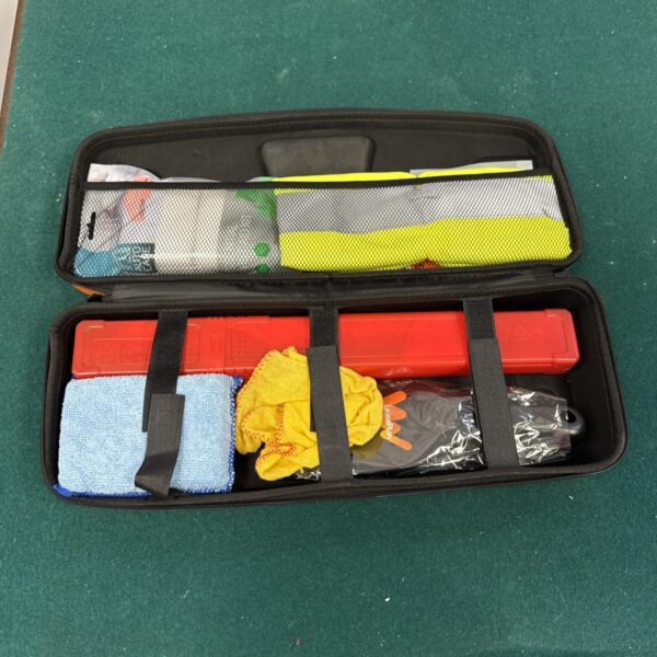Red Leaseplan car safety kit with high-visibility vest visible.