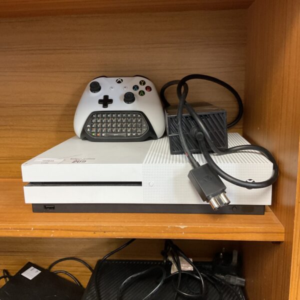 Xbox One S console and controller for gaming.