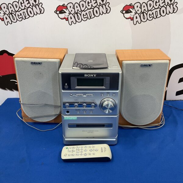 Silver Sony CMT-NE3 micro hi-fi system with speakers.