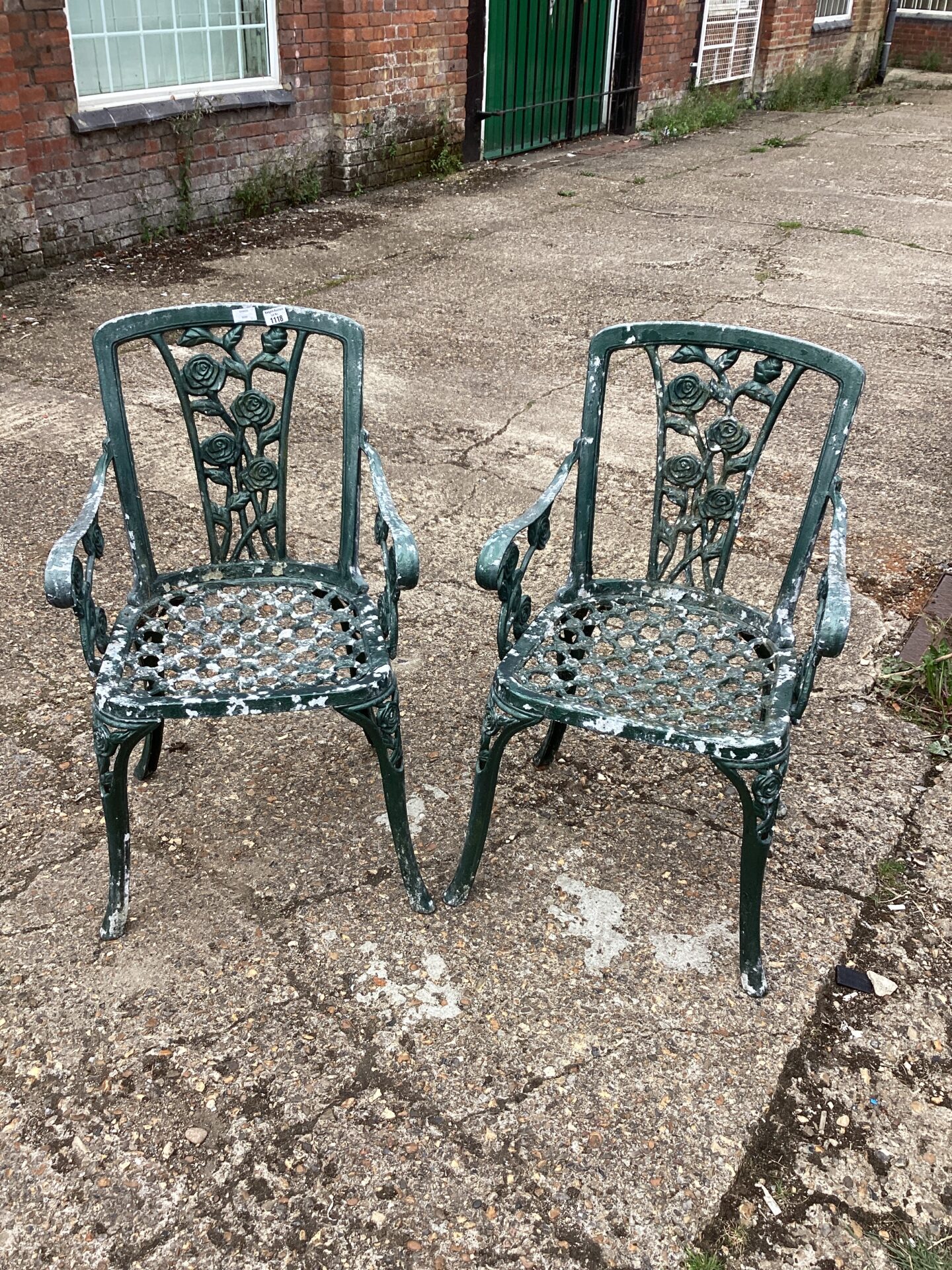 1118 Two metal garden chairs
