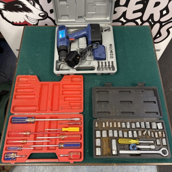 Socket set, screwdriver set, and Hilka cordless drill in a case.