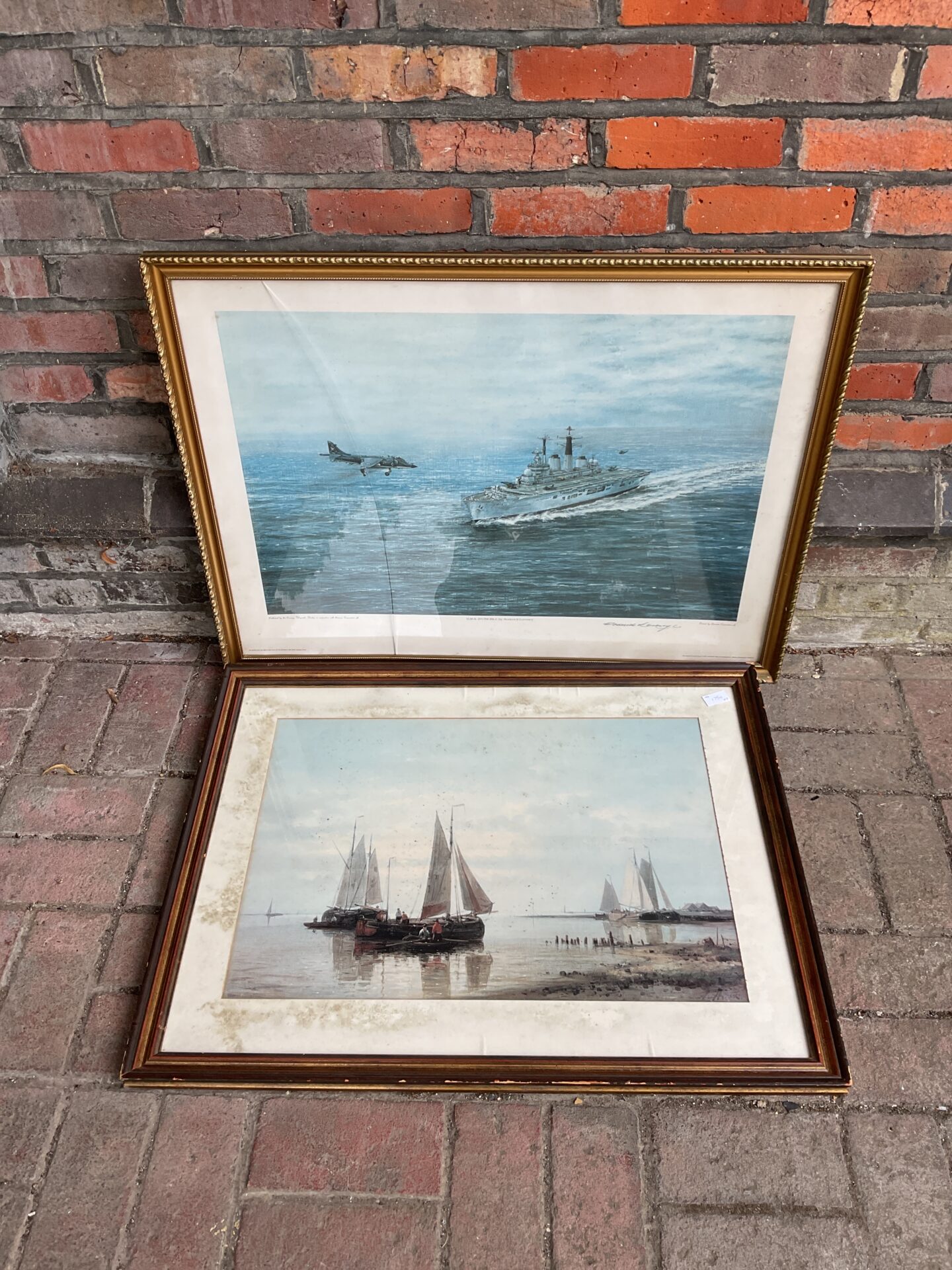 640 Two large gilt framed nautical prints including signed hms invincible by roderick lovesey