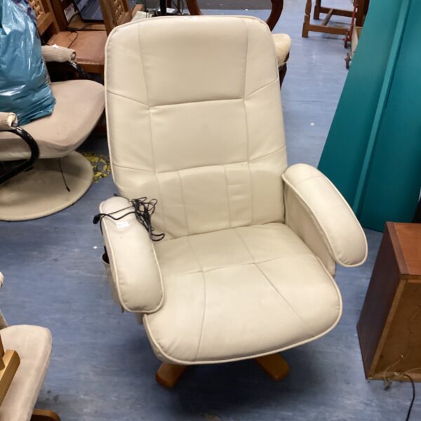 Cream leather reclining massage armchair for comfortable relaxation.