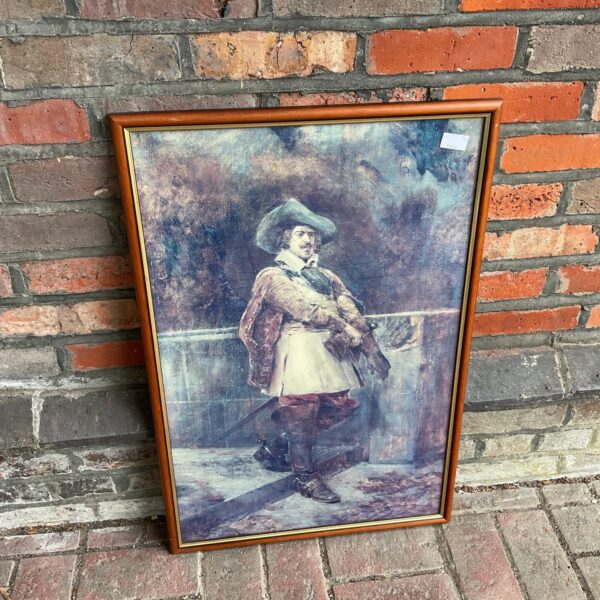 Large framed vintage print of the Laughing Cavalier portrait.