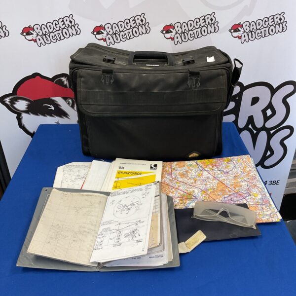 Vintage courier bag with ephemera and travel documents inside.