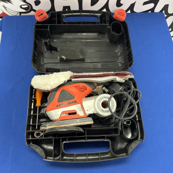 Vintage Black & Decker electric sander in used condition, ideal for DIY projects.