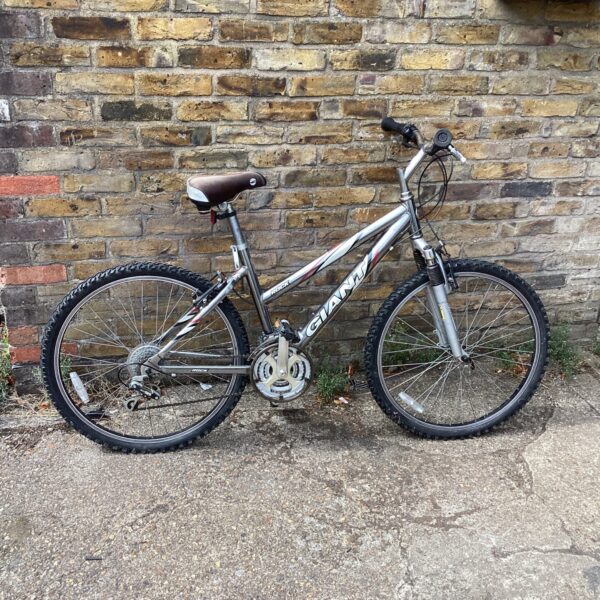 Side view of a used Giant Rock ladies mountain bike.