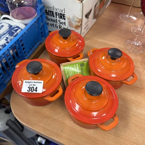 Vintage orange ceramic casserole dish with lid.
