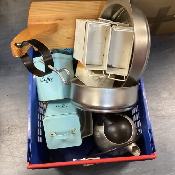 Vintage kitchenware lot featuring a unique ham holder and enamel teapot.