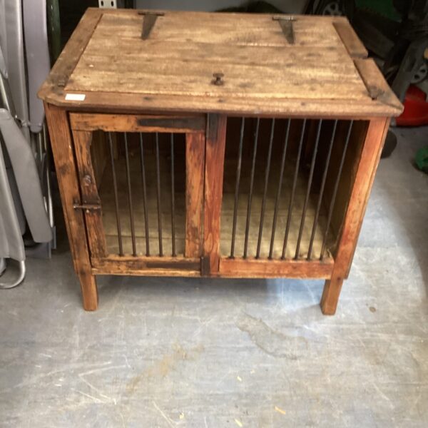 Vintage pine cabinet with shuttered front, ideal for farmhouse style.