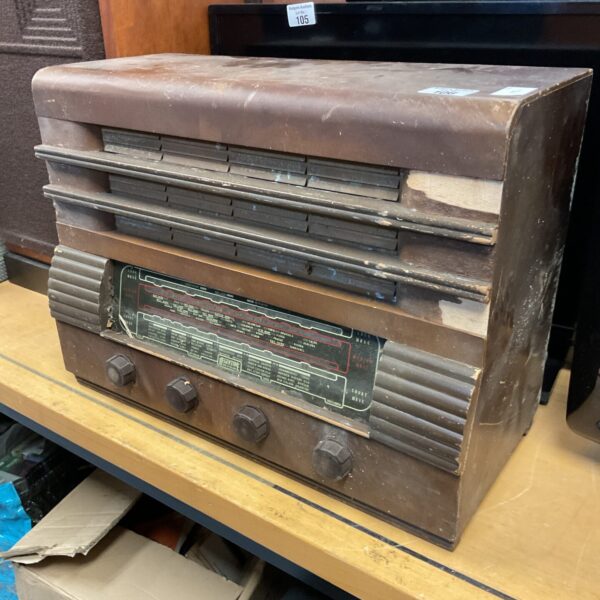 Front view of a vintage Regentone valve radio with wooden cabinet.