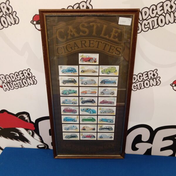 Framed collection of vintage Players cigarette cards featuring classic cars.