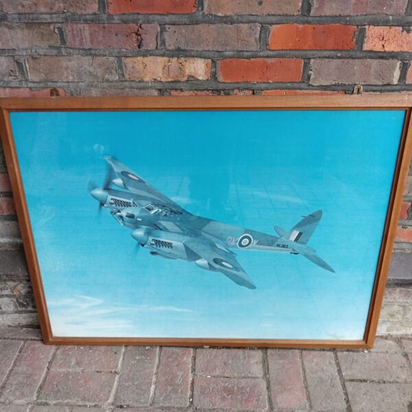 Large framed print of a de Havilland Mosquito fighter bomber aircraft.