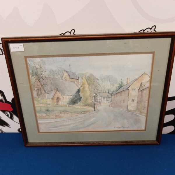 Watercolour painting of a village church by Carolyn Mannouch.