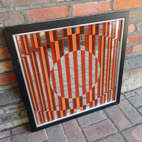 Vintage retro striped mirror with orange and white geometric pattern.