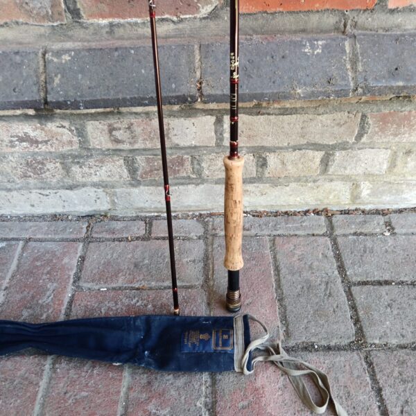 Vintage Hardy Deluxe fly fishing rod with original bag.