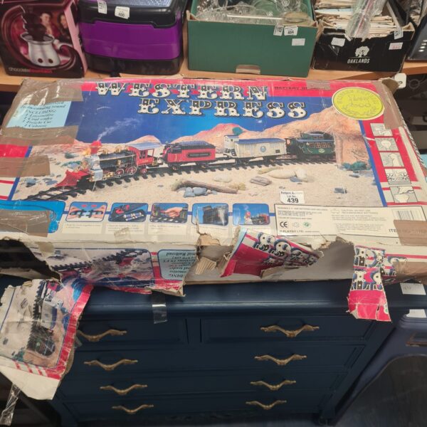 Vintage Playg Western Express train set with track pieces.