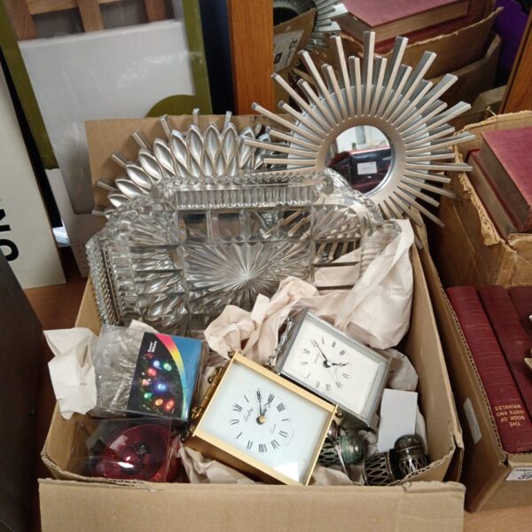 Vintage carriage clocks and sunburst mirrors in a mixed lot.