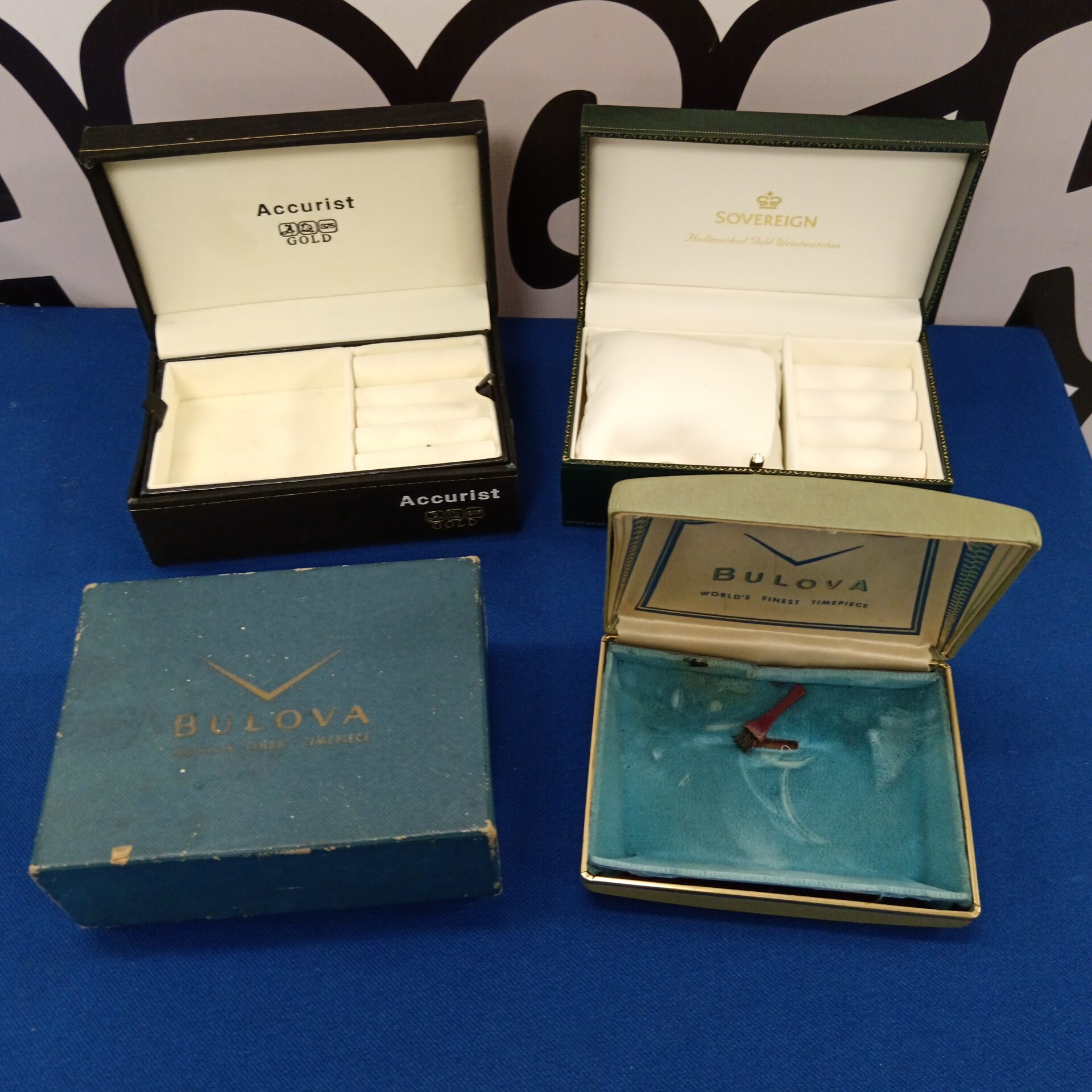 757 Three empty designer watch boxes including bulova, accurist & sovereign