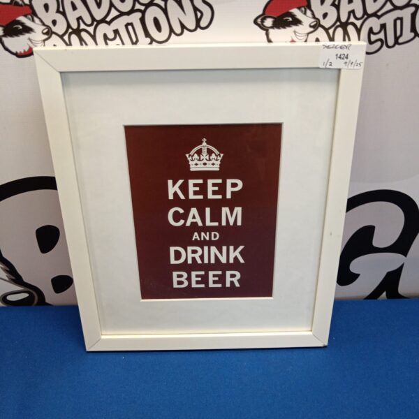 Framed "Keep Calm and Drink Beer" print for wall decor.