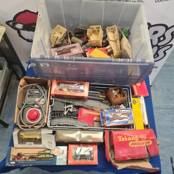 Vintage Triang Hornby model railway lot with rolling stock and track.