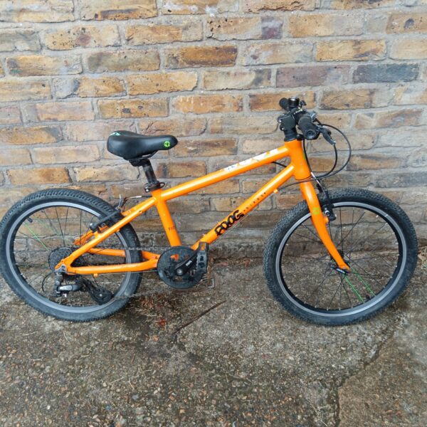 Bright orange Frog 40 kids bicycle in used condition.