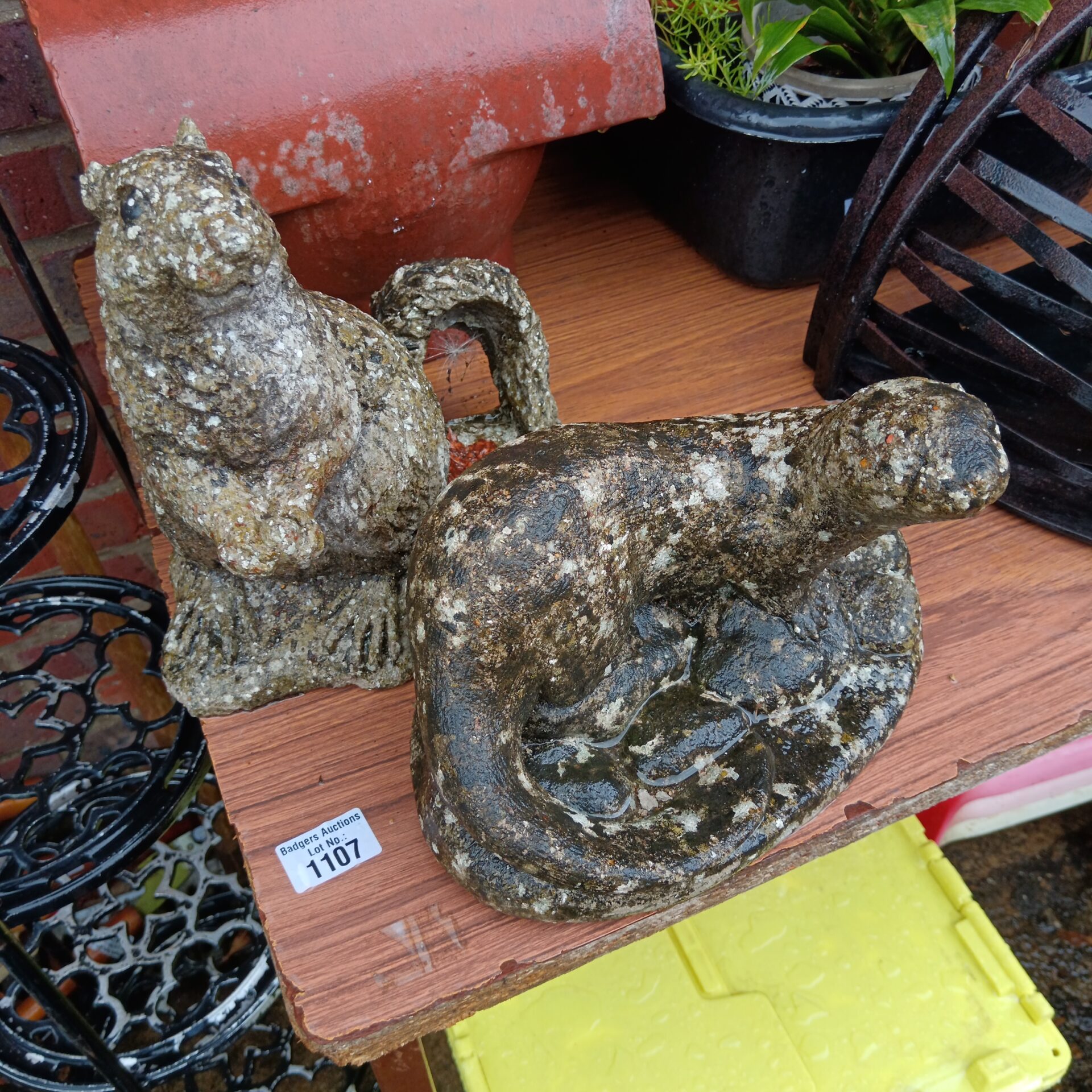 1107 Concrete garden squirrel & otter ornaments